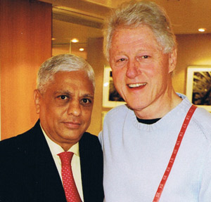 President Bill Clinton with Sam Melwani of Sam's Tailor.