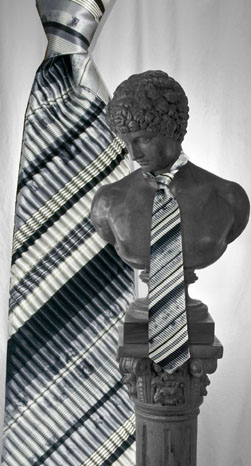 The Custom Shop Clothiers Gray and Black Stripe Pleated Tie: US$395.