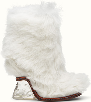 Fendi White lamb fur ankle boots with round toe and wedge: €1,390.