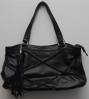 Black Nyla Noor Leather Bag.