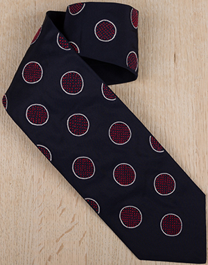 Jupe by Jackie Clooney for Hockney Hand embroidered balls on navy silk tie: €250.