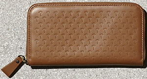 Tomas Maier women's zip around wallet: US$445.